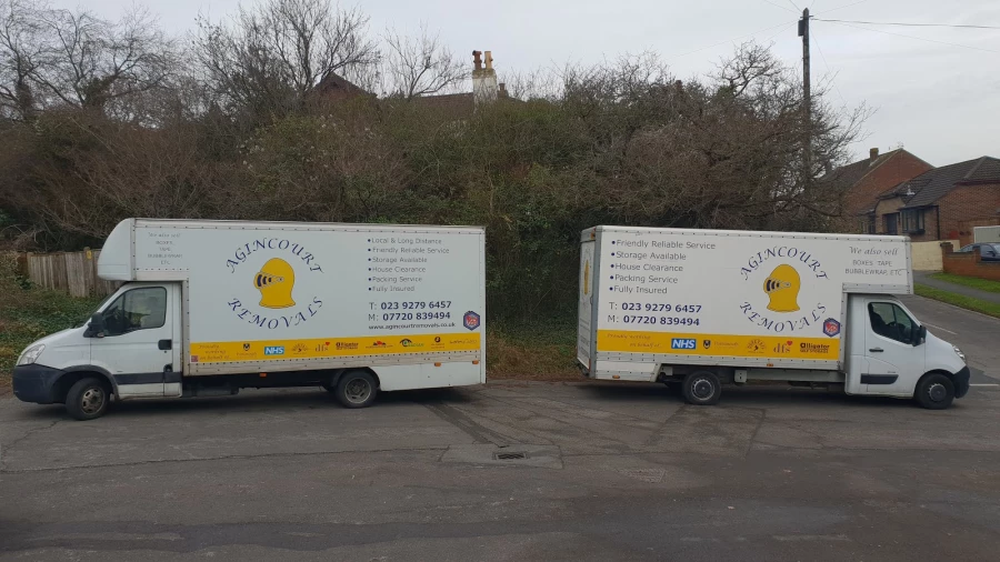 Two Agincourt Removals vehicles ready for work